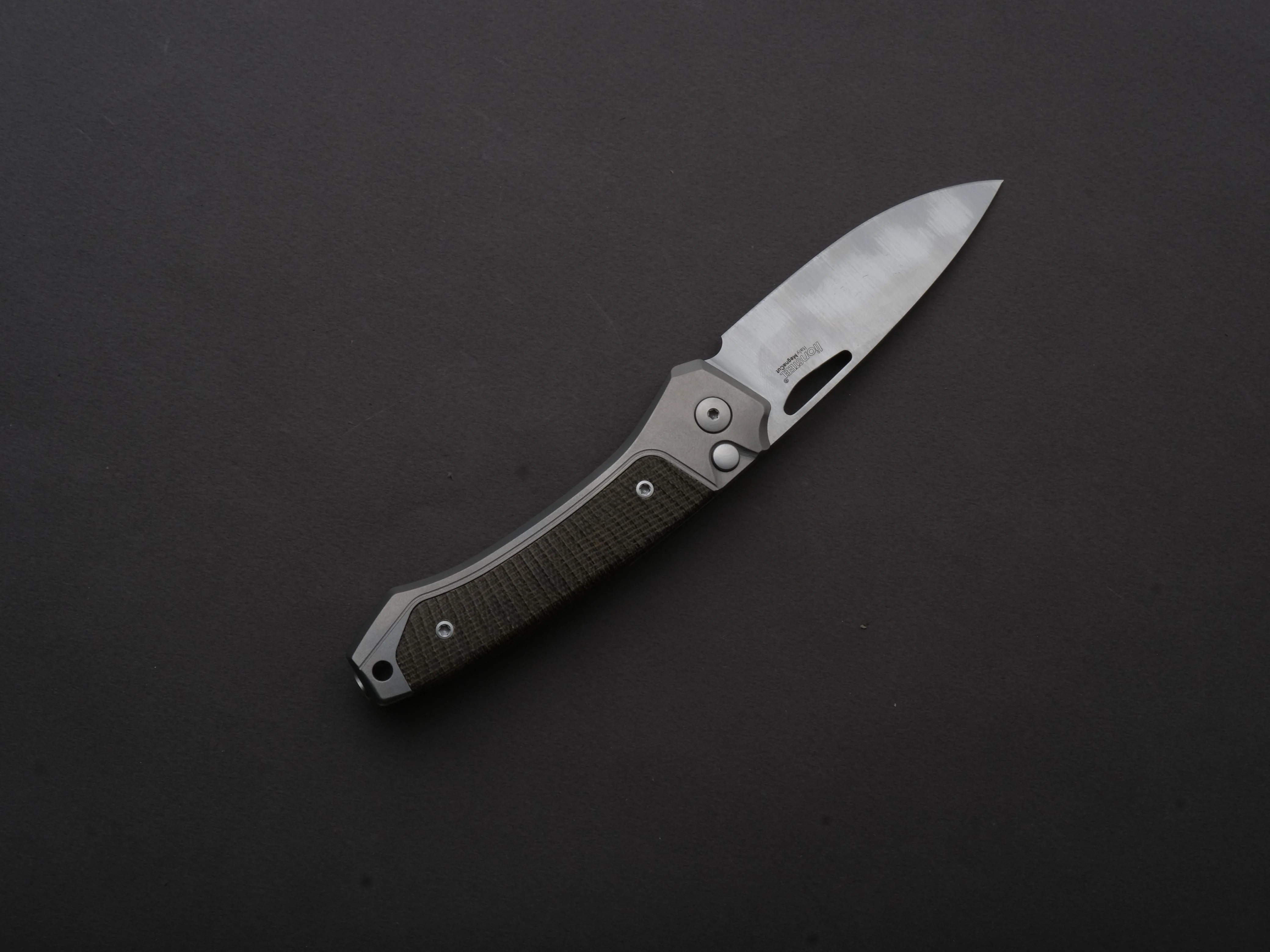 lionSTEEL - Folding Knife - Button Lock - Twain - MagnaCut - 80mm - Titanium Handle w/ Green Canvas Inlay - Image 2